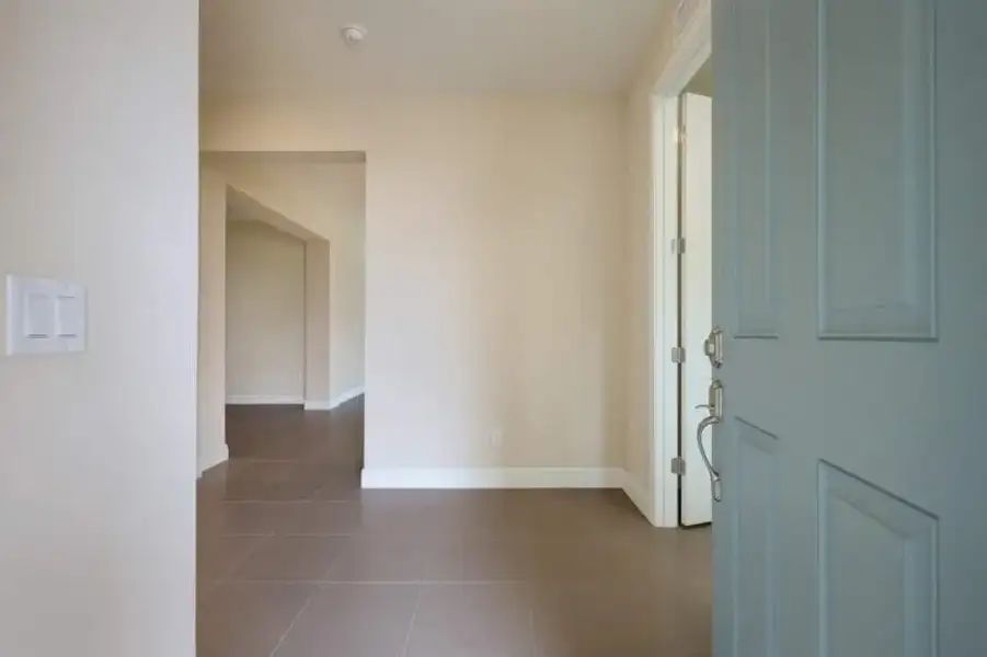 Representative unfurnished interior of a home built from the Boca Grande by Medallion Home in Reflection Villas at Watercolor Place, Bradenton (Image 11).