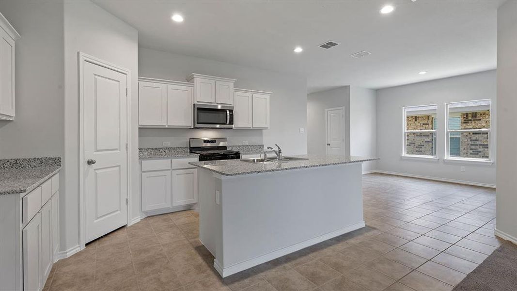 Furnished interior view inside a new home in Springhill South, Boyd (Image 6).
