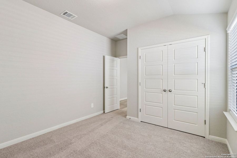 Spacious, unfurnished interior of a new home in Estancia Ranch - Premier Series, San Antonio (Image 33).