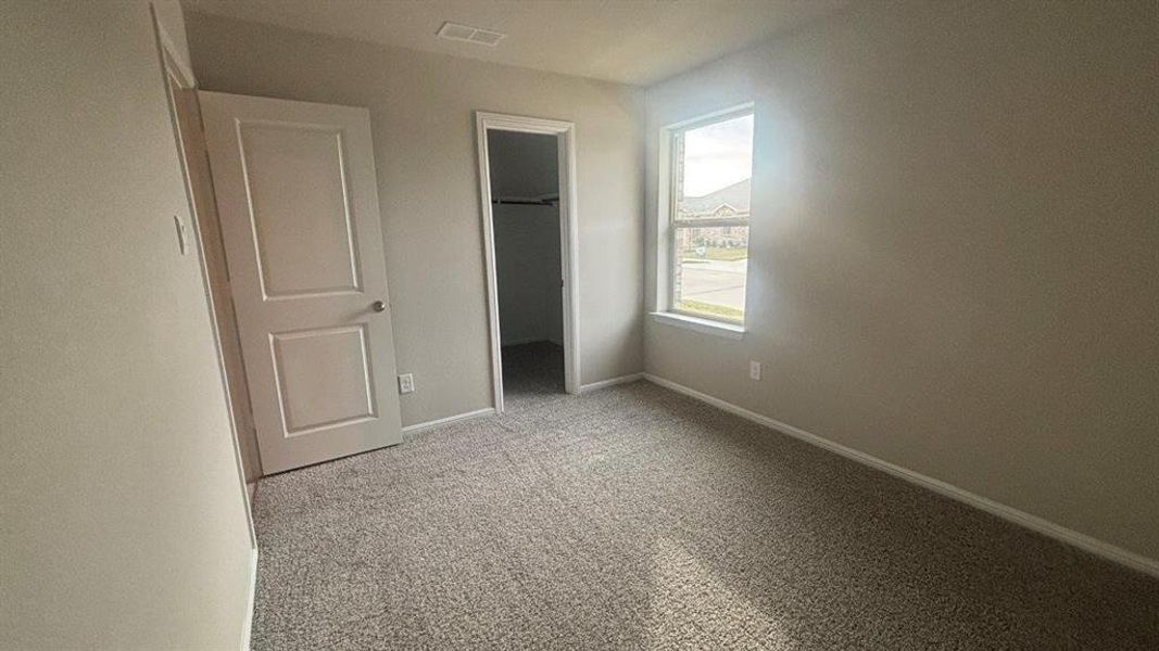 Spacious, unfurnished interior of a new home in Highlands at Chapel Creek, Fort Worth (Image 13).