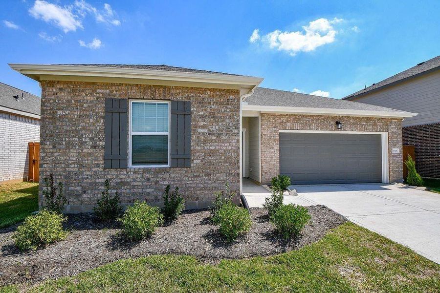 Front exterior of a new home in , Katy, TX, highlighting curb appeal (Image 1). Front exterior of a new home in , Katy, TX, highlighting curb appeal (Image 1).