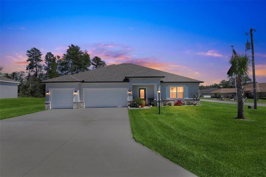 Front exterior of a new home in , Ocala, FL, highlighting curb appeal (Image 1). Front exterior of a new home in , Ocala, FL, highlighting curb appeal (Image 1).