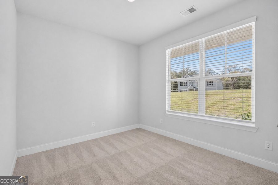 Spacious, unfurnished interior of a new home in Stone Brooke, Gray (Image 8).