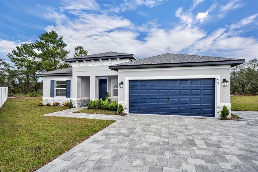 Front exterior of a new home in , Kissimmee, FL, highlighting curb appeal (Image 1).