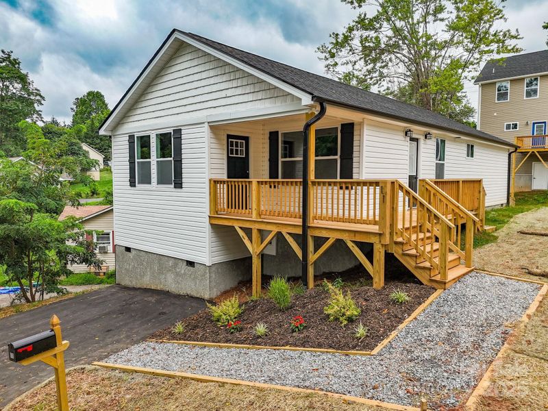 Front exterior of a new home in , Asheville, NC, highlighting curb appeal (Image 24).