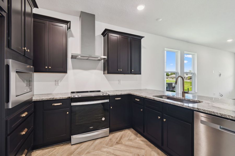 Furnished interior view inside a new home in Avalon West, Spring Hill (Image 27).