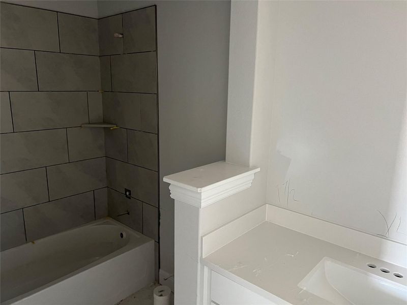 Bathroom with shower / tub combination