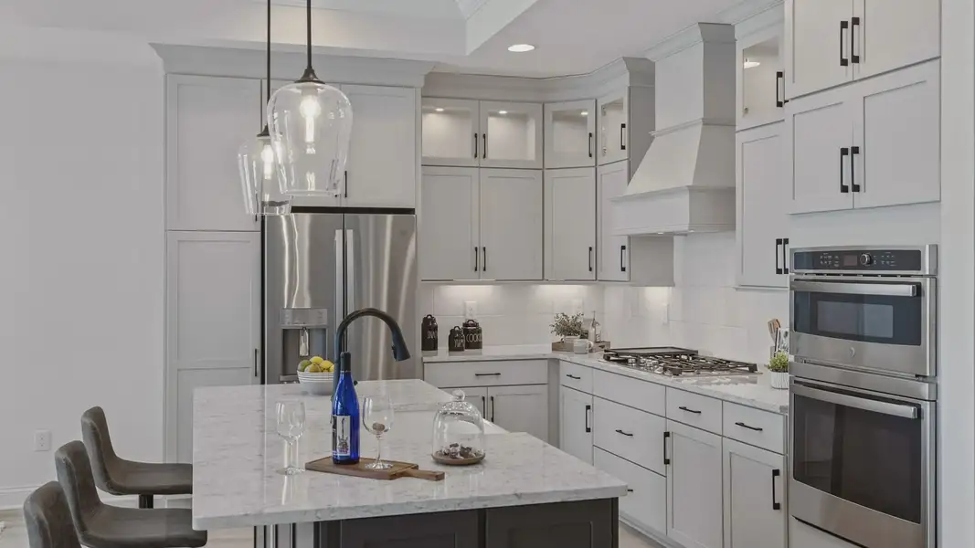 Representative furnished interior of a home built from the Salerno by Epcon Communities in Courtyards by Carrell, Ocean Isle Beach (Image 7).