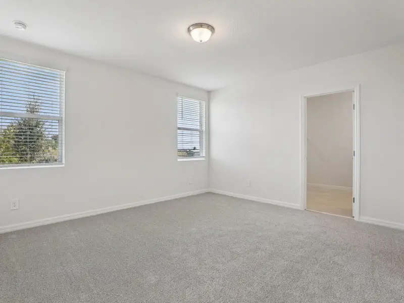 Spacious, unfurnished interior of a new home in The Meadow at Crossprairie, St. Cloud (Image 10).