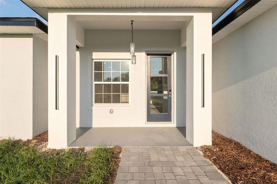 Front exterior of a new home in , Ocala, FL, highlighting curb appeal (Image 20). Front exterior of a new home in , Ocala, FL, highlighting curb appeal (Image 20).
