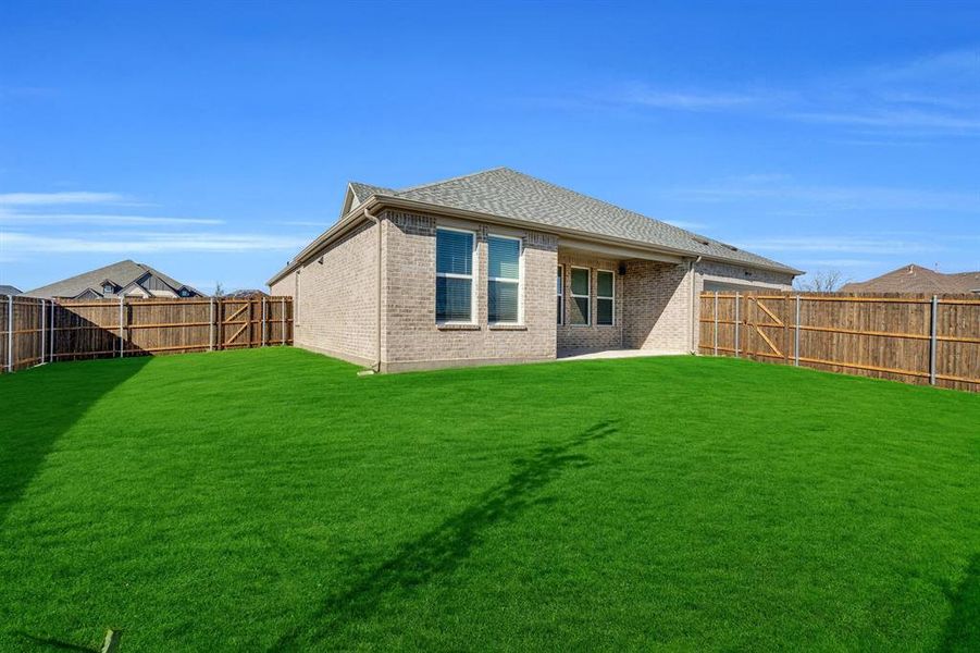 Exterior details and patio area of a home in Ten Mile Creek Estates, DeSoto (Image 21). Exterior details and patio area of a home in Ten Mile Creek Estates, DeSoto (Image 21).