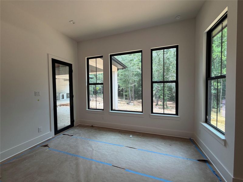Sitting area and door to massive patio in Primary Bedroom Sitting area and door to massive patio in Primary Bedroom