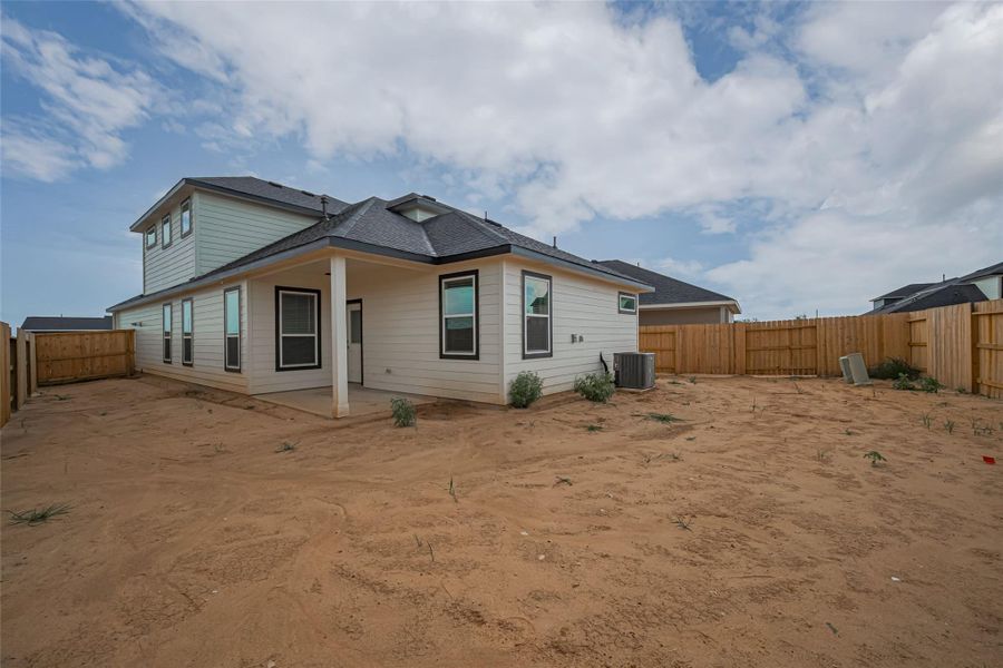 Exterior details and patio area of a home in La Segarra, Brookshire (Image 4).