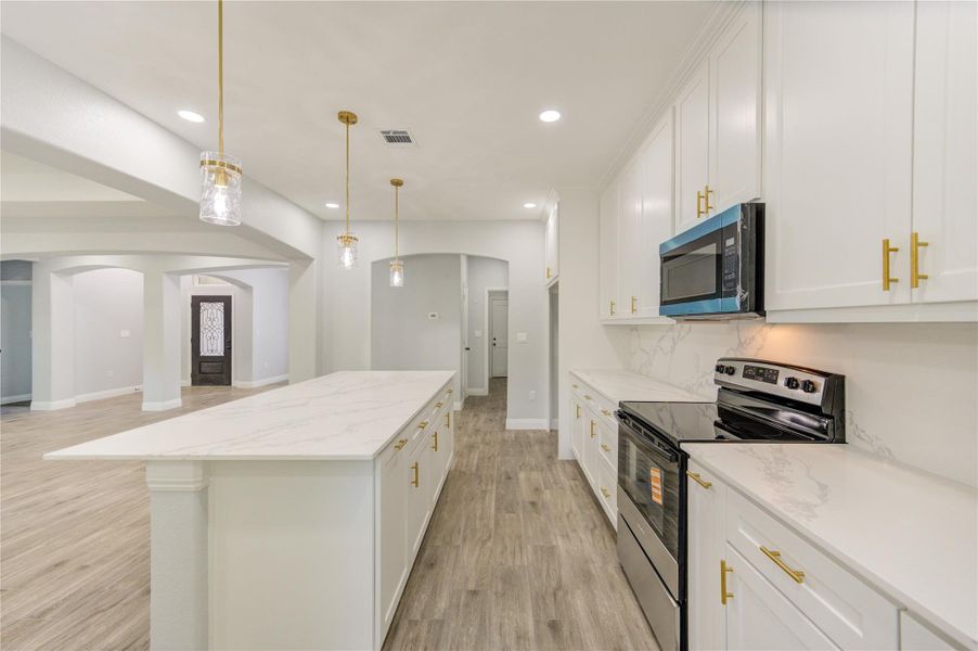 Furnished interior view inside a new home in , Woodbranch (Image 6).