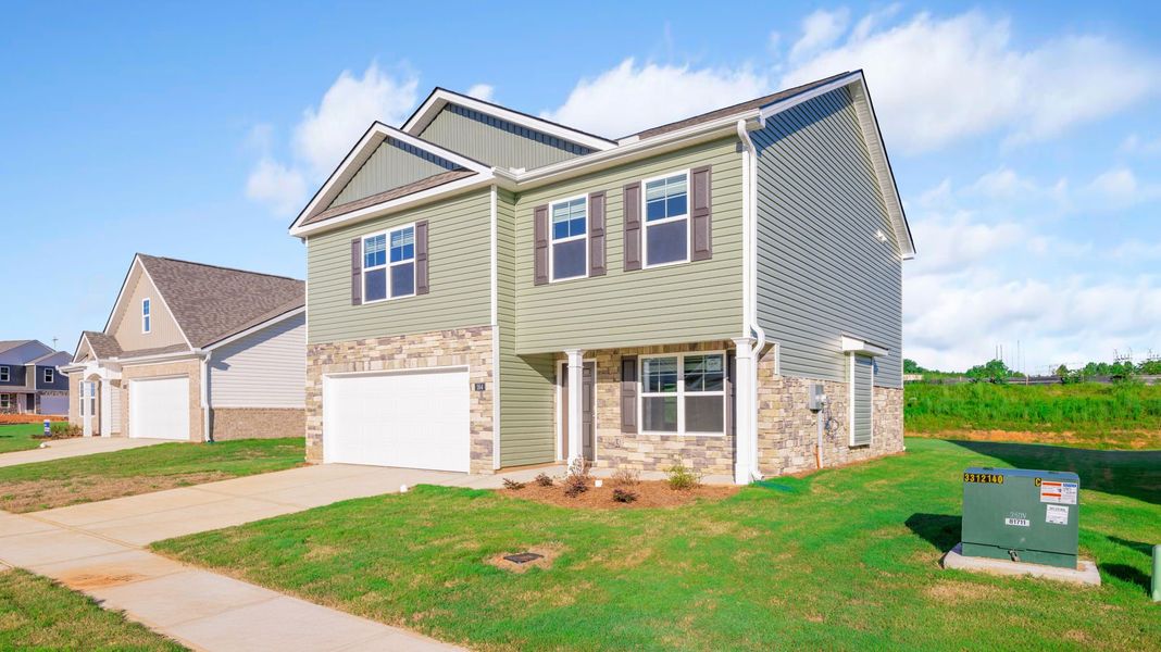 Front exterior of a new home in Price's Crossing, LaFayette, GA, highlighting curb appeal (Image 2). Front exterior of a new home in Price's Crossing, LaFayette, GA, highlighting curb appeal (Image 2).