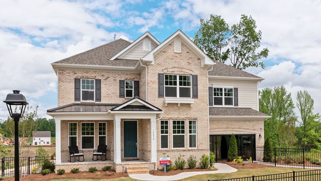 Representative exterior photo of a completed home built from the London by Taylor Morrison in Walden Woodlands, Huntersville, NC (Image 17). Representative exterior photo of a completed home built from the London by Taylor Morrison in Walden Woodlands, Huntersville, NC (Image 17).