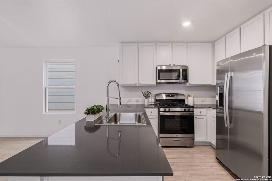 Furnished interior view inside a new home in Aston Park: Wellton Collection, San Antonio (Image 11).