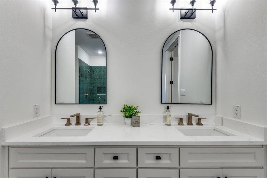 Master Full bath with a shower stall and double vanity