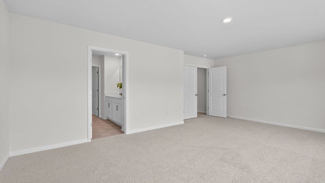 Spacious, unfurnished interior of a new home in The Townes at Anderson Farm, Wendell (Image 25).