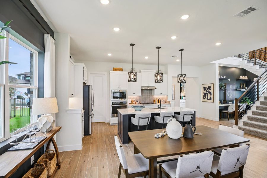 Furnished interior view inside a new home in Bridgeland, Cypress (Image 11).