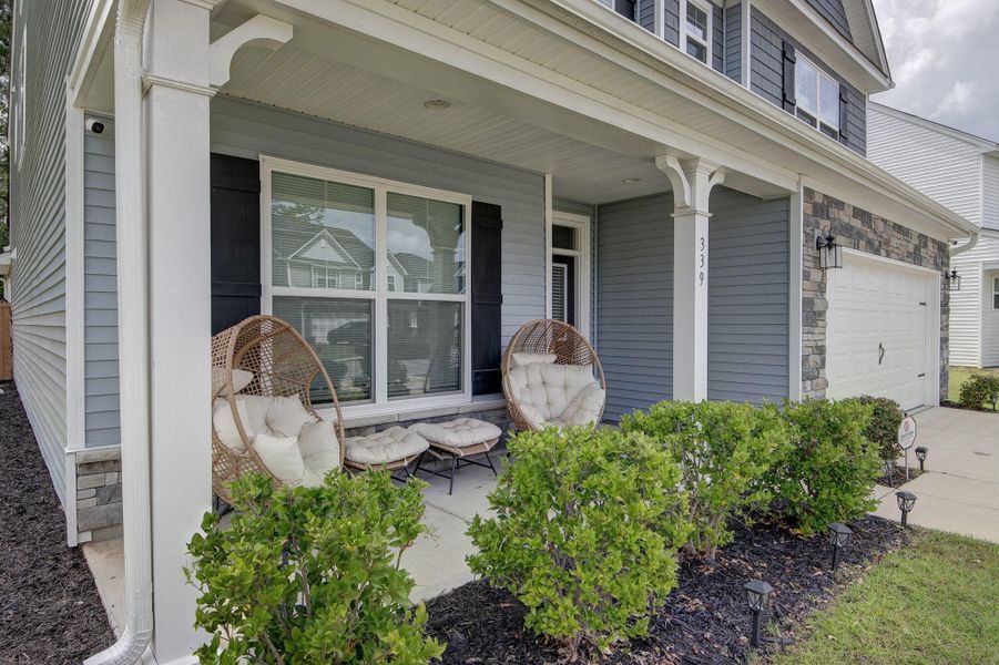 Exterior details and patio area of a home in Oakley Pointe, Moncks Corner (Image 40). Exterior details and patio area of a home in Oakley Pointe, Moncks Corner (Image 40).