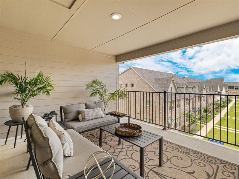Enjoy elevated, picturesque views overlooking the beautiful crepe-myrtle-lined boulevard below.