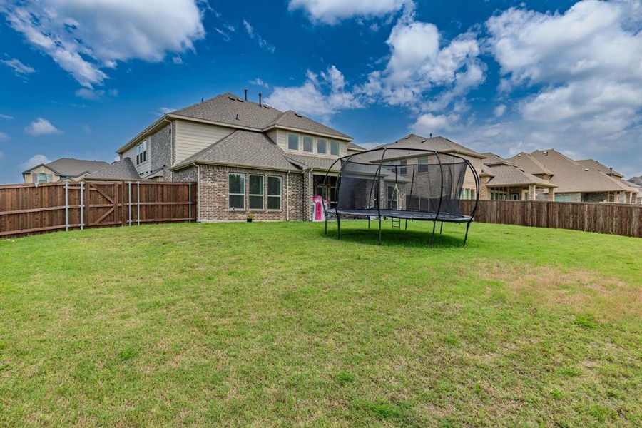 Exterior details and patio area of a home in Grayhawk Addition, Forney (Image 26).