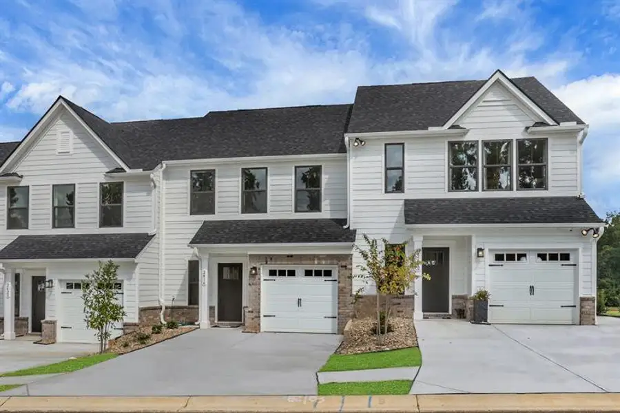 Front exterior of a new home in Laurel Fields, Gainesville, GA, highlighting curb appeal (Image 2).