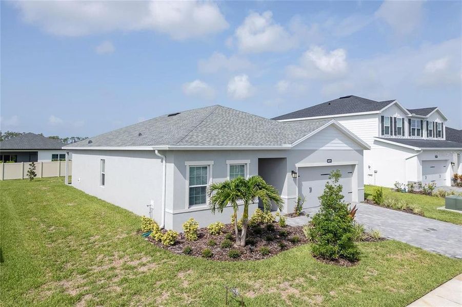 Front exterior of a new home in , Port Charlotte, FL, highlighting curb appeal (Image 2). Front exterior of a new home in , Port Charlotte, FL, highlighting curb appeal (Image 2).