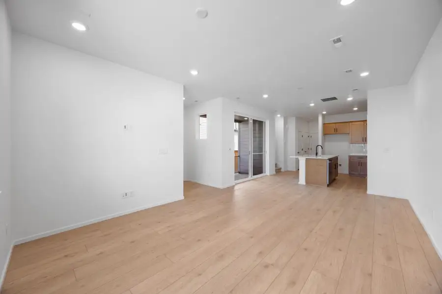 Spacious, unfurnished interior of a new home in Sky Ranch, Watkins (Image 12).