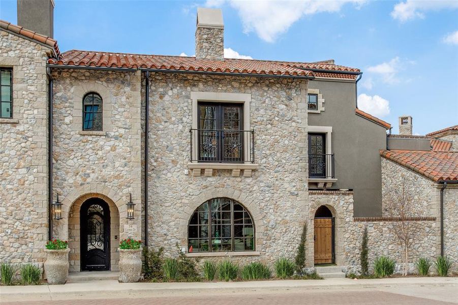 Mediterranean / spanish home featuring a balcony