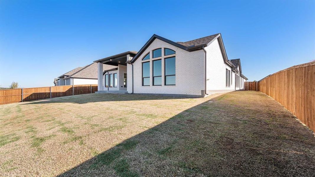 Exterior details and patio area of a home in Talon Hills 60'/70', Fort Worth (Image 2).