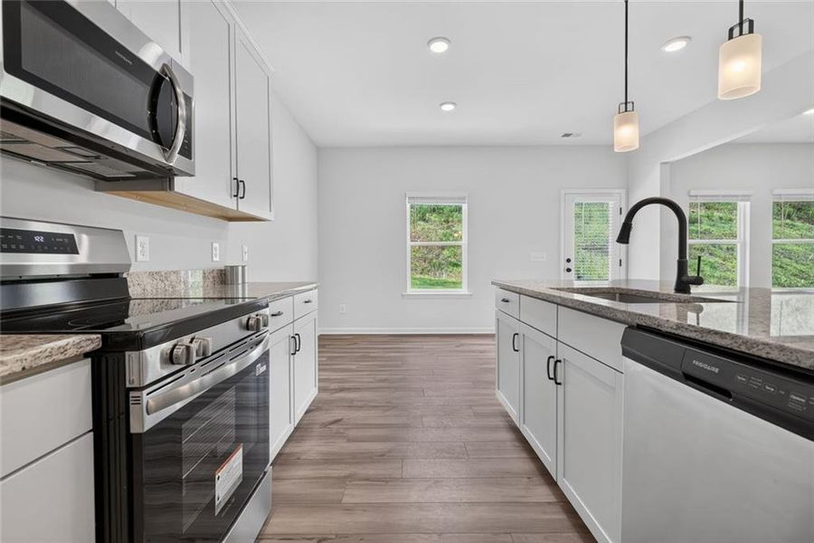 Furnished interior view inside a new home in Saddle Ridge, Calhoun (Image 4).