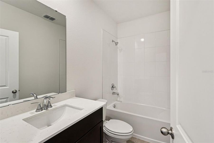 Furnished interior view inside a new home in Wynnstone - Classic Series, Haines City (Image 10).