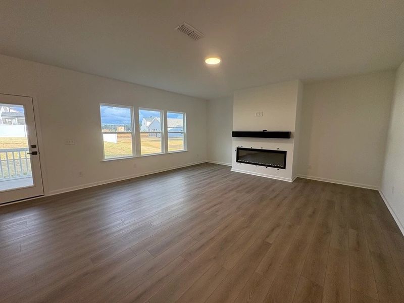 Family Room featuring AW Collection® Oxford - Relaxed living with timeless tones. Family Room featuring AW Collection® Oxford - Relaxed living with timeless tones.