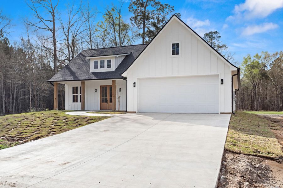 Front exterior of a new home in , Vidor, TX, highlighting curb appeal (Image 25). Front exterior of a new home in , Vidor, TX, highlighting curb appeal (Image 25).