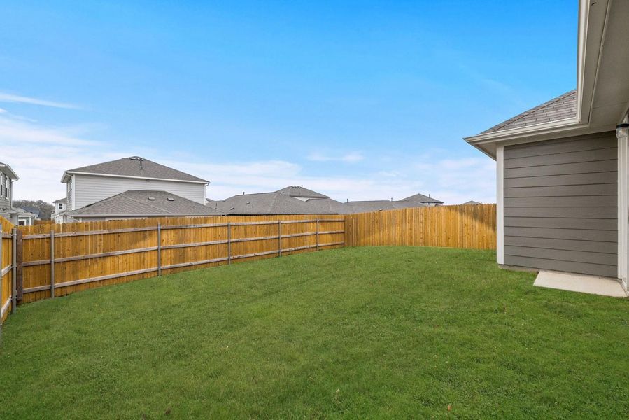 Exterior details and patio area of a home in Trinity Ranch, Elgin (Image 3).