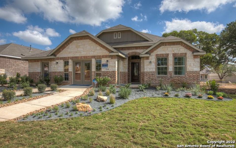 Front exterior of a new home in Navarro Ranch: Brookstone II and Woodbridge Collection, Seguin, TX, highlighting curb appeal (Image 16).