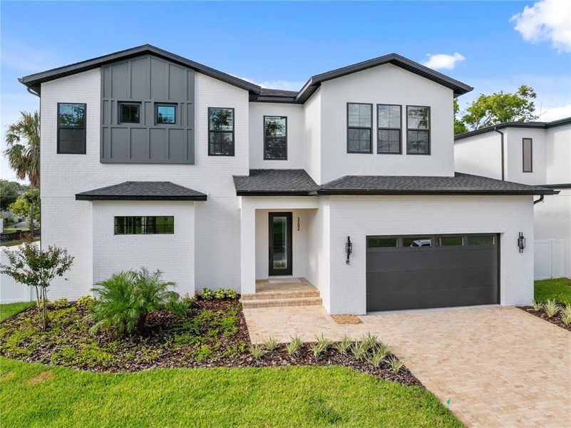 Front exterior of a new home in , Tampa, FL, highlighting curb appeal (Image 1). Front exterior of a new home in , Tampa, FL, highlighting curb appeal (Image 1).
