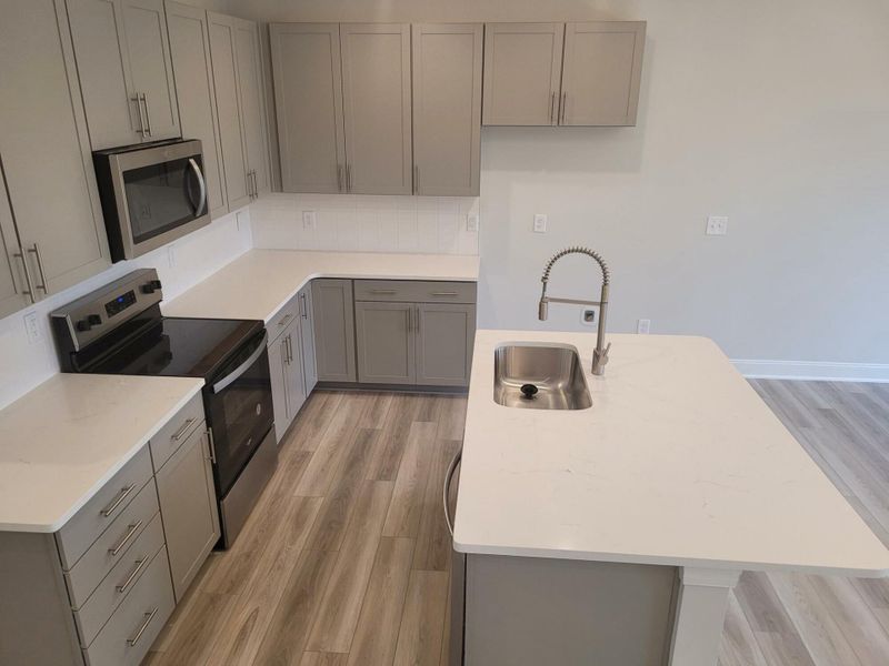 Furnished interior view inside a new home in 1158 Place Townhomes, Wilson (Image 6).