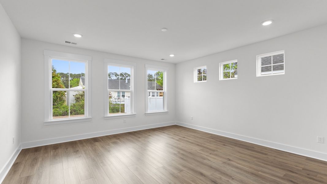 Furnished interior view inside a new home in Bluffs at Sun Colony, Longs (Image 10).