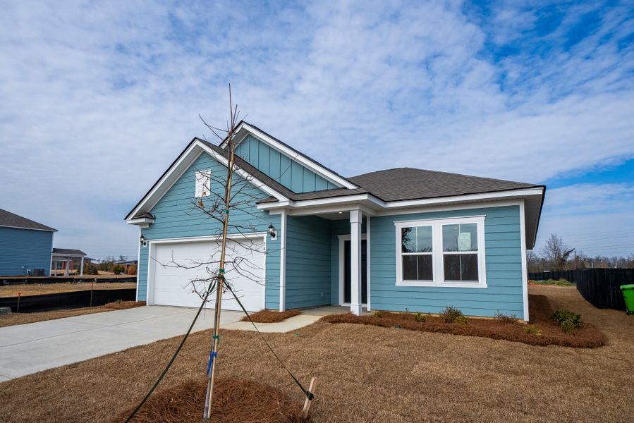 Front exterior of a new home in Monroe Preserve, Chapin, SC, highlighting curb appeal (Image 28).