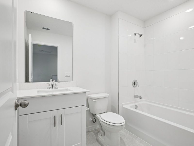 Furnished interior view inside a new home in The Reserve at Hammock Oaks Townes, Lady Lake (Image 6).