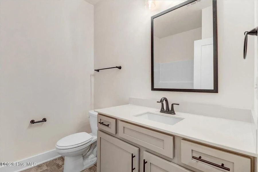 Furnished interior view inside a new home in East Lake, Leland (Image 4).