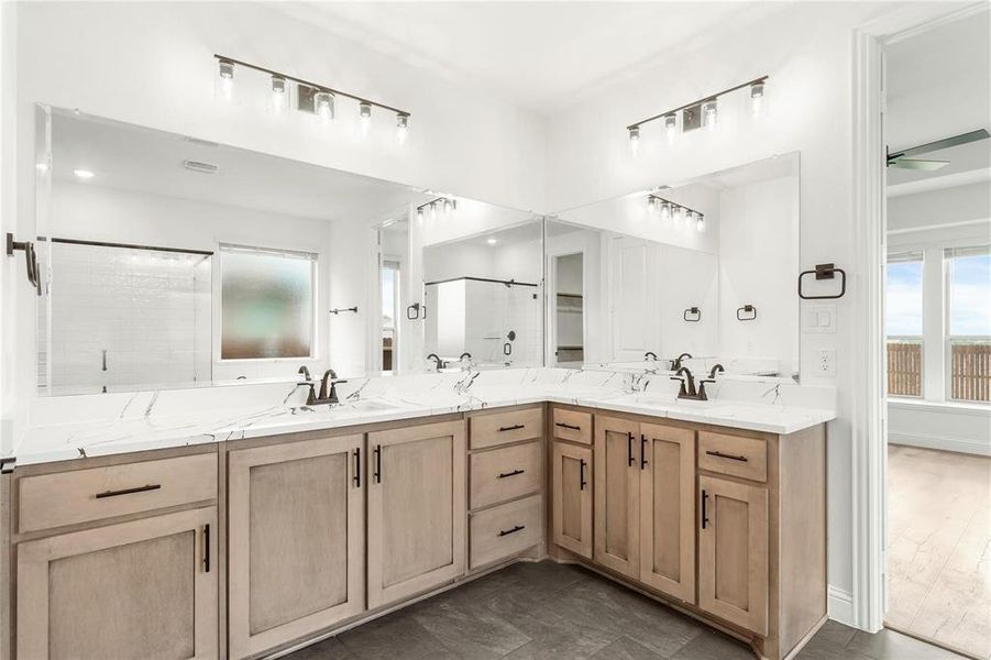 Double Vanities & dual sinks are a must for the Primary bath, and just look at all the drawers, cabinets & storage.