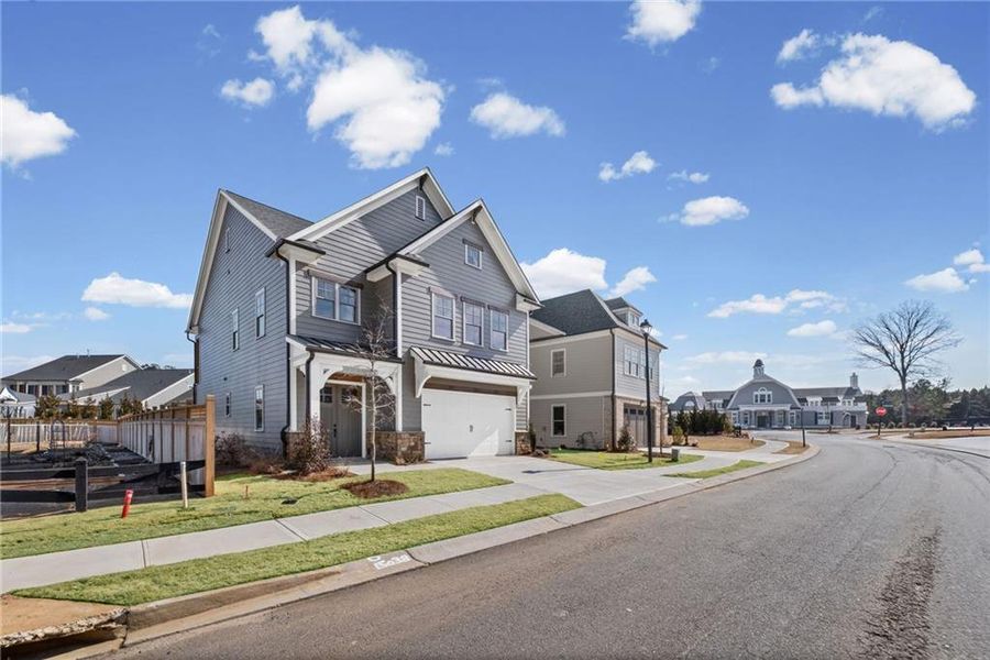 Front exterior of a new home in , Canton, GA, highlighting curb appeal (Image 23).