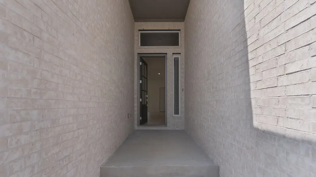Exterior details and patio area of a home in Santa Rita Ranch, Liberty Hill (Image 3).