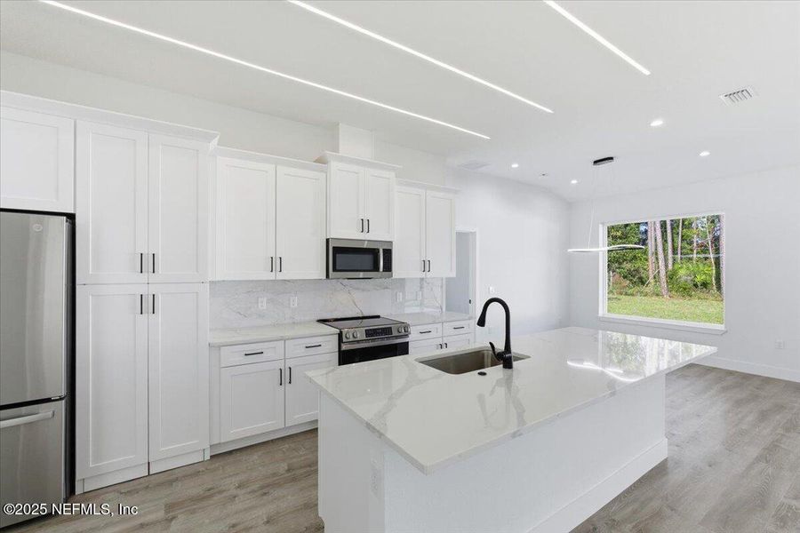 Furnished interior view inside a new home in , Palm Coast (Image 8). Furnished interior view inside a new home in , Palm Coast (Image 8).