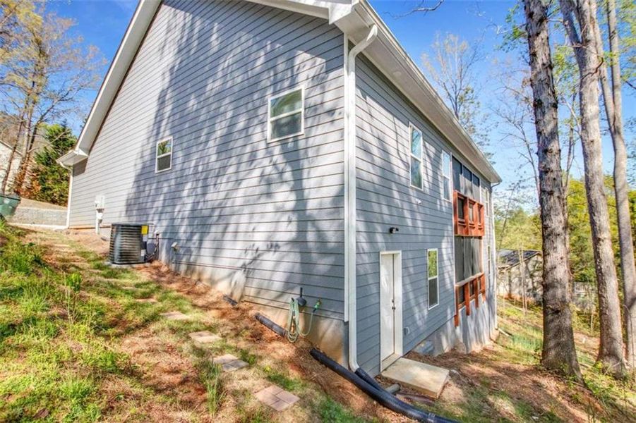 Exterior details and patio area of a home in , Clarkesville (Image 27).