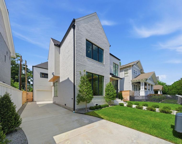 Front exterior of a new home in , Houston, TX, highlighting curb appeal (Image 28). Front exterior of a new home in , Houston, TX, highlighting curb appeal (Image 28).